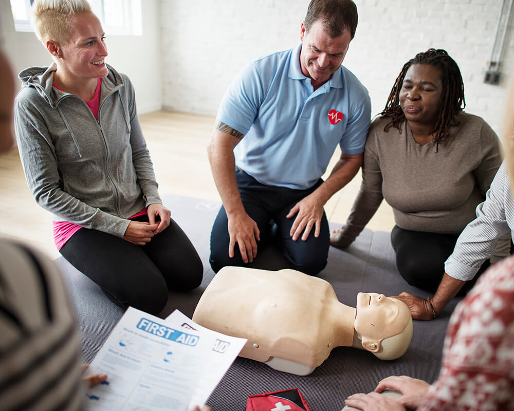 Adults Practicing CPR
