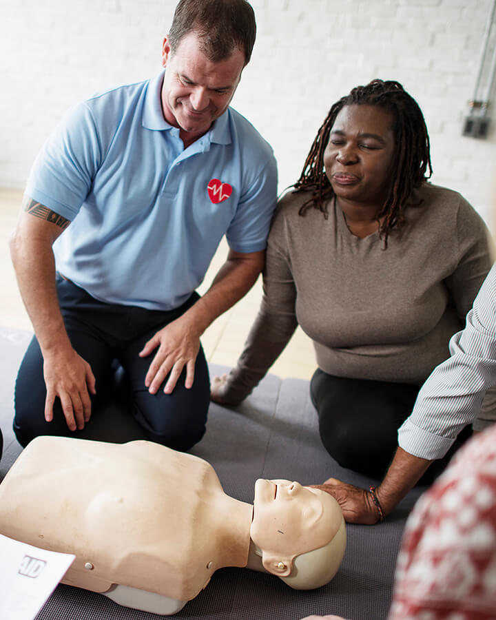Adults Practicing CPR